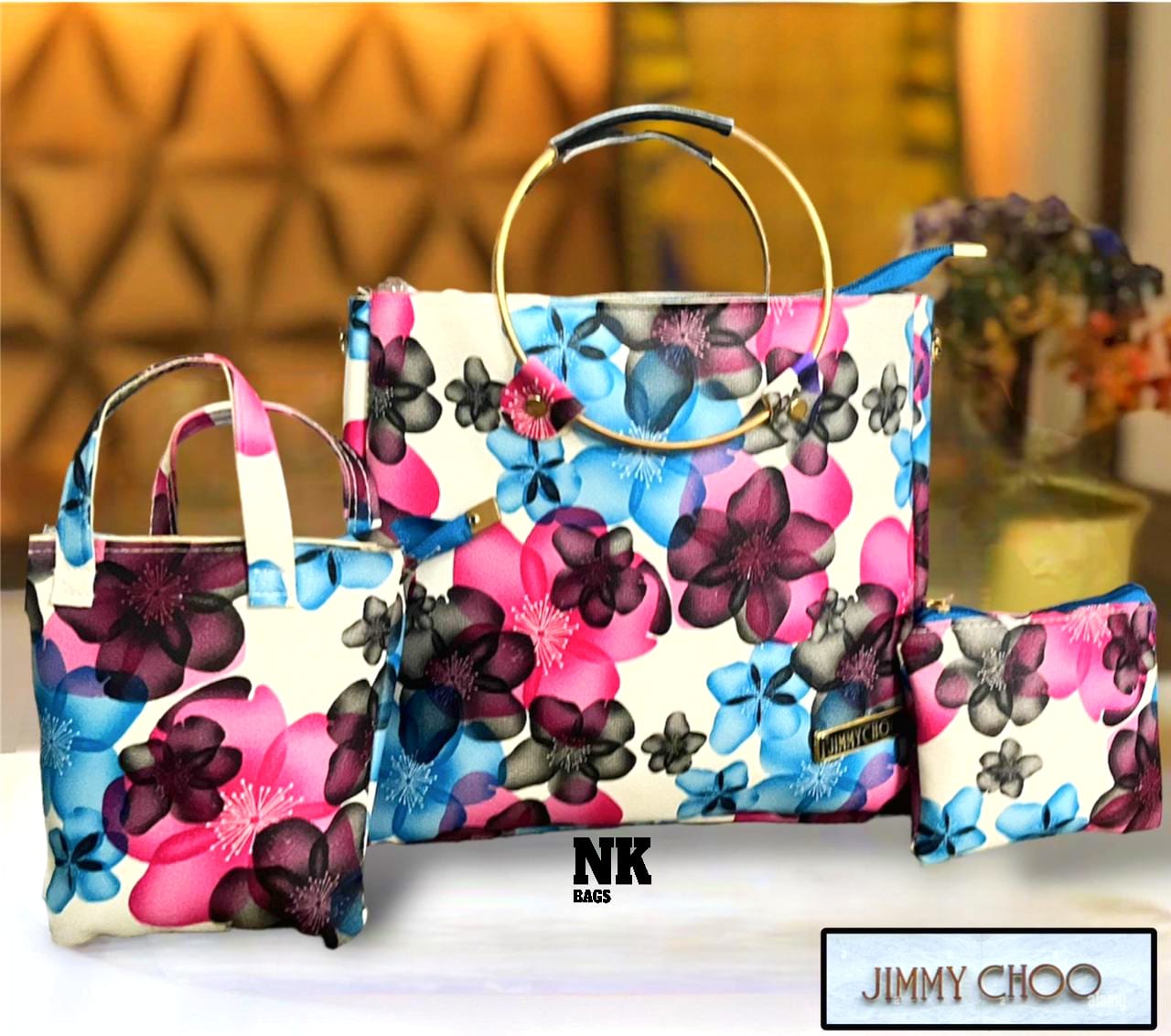 1030A. JIMMY CHOO purse, 3 pc combo, Round steel dual handle, flowery printed. Size